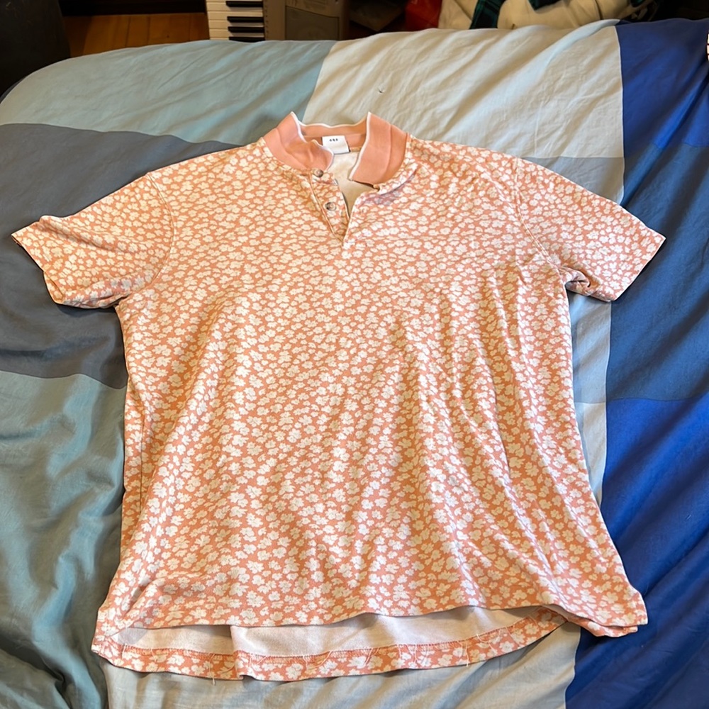 Pink Polo with White Flowers from Urban Outfitters